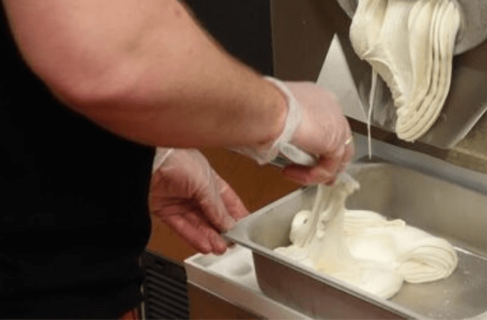 نقش دستگاه بار صفت کن بستنی در بهبود کیفیت تولید